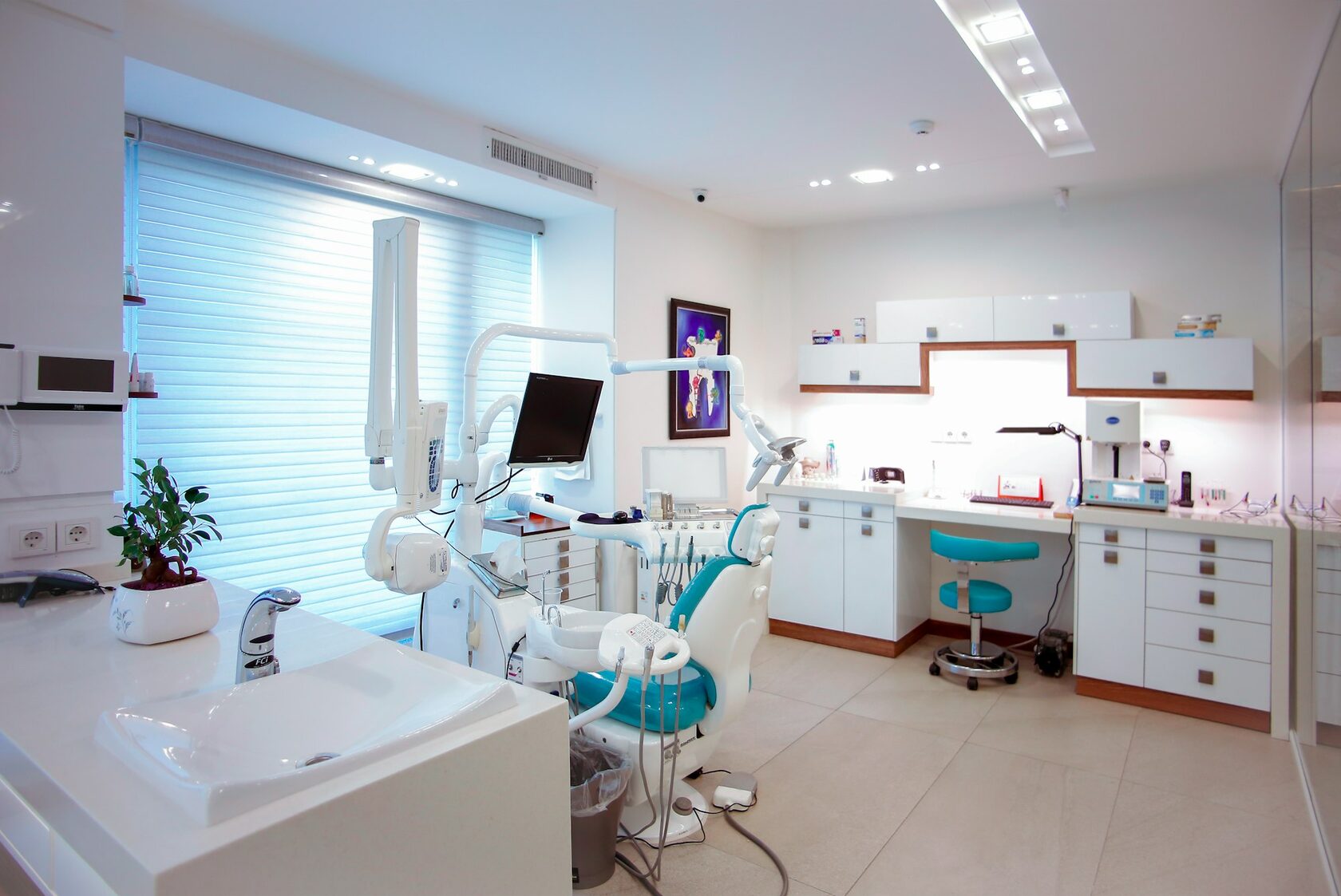 Bright, modern dental treatment room with light-filled windows